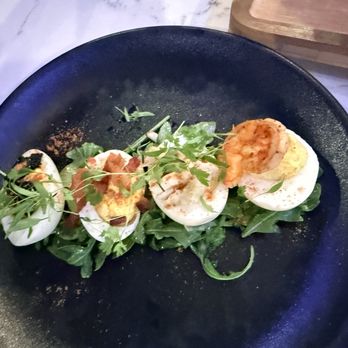 BLK SWAN - Angel eggs - caviar, bacon, lump crap and shrimp. The filling was not as flavorful as I expected but they were very good. - New American Near Me - Baltimore, Maryland