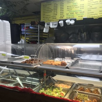 JJJ Caribbean Restaurant - Counter and menu - Caribbean Near Me - York, Ontario