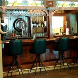 Claim Jumpers PubnGrub - Rustic bar with tap beers & wine.
