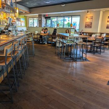 California Pizza Kitchen - Mostly empty interior on a Sunday evening - Pizza Near Me - Long Beach, California California Pizza Kitchen - Mostly empty interior on a Sunday evening - Pizza Near Me - Long Beach, California