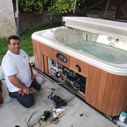 Justin replacing the circulation pump on our spa. Justin replacing the circulation pump on our spa.