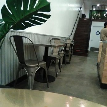 Mini Monster Cafe - Pathway with seating area and stairs leading to more dine in options - Ice Cream & Frozen Yogurt Near Me - Long Beach, California Mini Monster Cafe - Pathway with seating area and stairs leading to more dine in options - Ice Cream & Frozen Yogurt Near Me - Long Beach, California