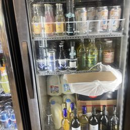 a refrigerator full of drinks a refrigerator full of drinks