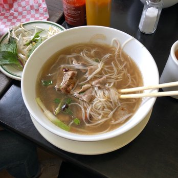 Riverside Cafe - a bowl of noodle soup with chopsticks - Breakfast & Brunch Near Me - Richmond, British Columbia Riverside Cafe - a bowl of noodle soup with chopsticks - Breakfast & Brunch Near Me - Richmond, British Columbia