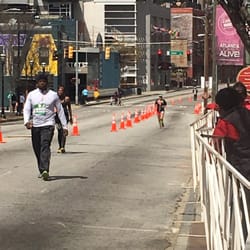Publix Georgia Marathon & Half Marathon - Nicole with 1/4 mile to finish