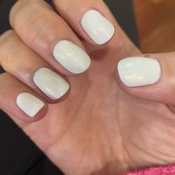 Nail Design - White with a bit of sparkle suggested by the lady who worked on it.
