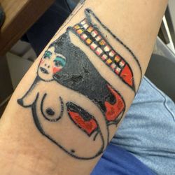 Hot Stuff Tattoo - Poorly done tattoo