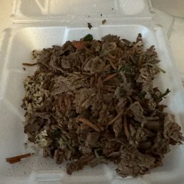 Burned meat and about three veggies cooked to death