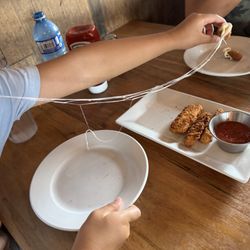 Chuck's Roadhouse Bar and Grill - Cheese pull