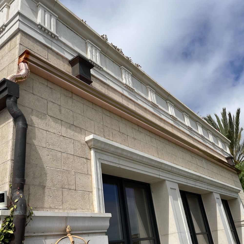 Anaheim Rain Gutter - Installed a new gutter here. Overtime it will oxidize and create a patina, a dark brown color just like the side gutters. - Gutter Services Near Me