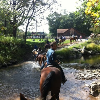 Mountain Creek Riding Stables - My wonderful fiancé crossing the creek - Horseback Riding Near Me - Cresco, Pennsylvania