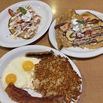 Loaded Cafe - Strawberry Banana Nutella® Crepes Combo Strawberry Almond Cheesecake Crepes (The hashbrown, egg, and sausage/bacon comes with the combo.) - American Near Me - Placentia, California