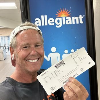 Allegiant Air - Me holding a boarding pass - Airlines Near Me - Mesa, Arizona