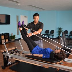HolistiCare Physical Therapy - Rehabilitation using the pilates reformer