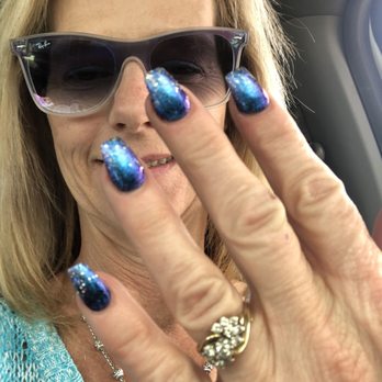 Nail's Heaven - Awesome blue that turns purple-urple when you move your hands with a dusting of a lil sparkle - Nail Salons Near Me - Hemet, California