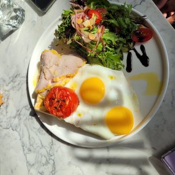Canffle - "Easy morning" on a mochi waffle with sunny side up eggs. - Waffles Near Me - Vancouver, British Columbia