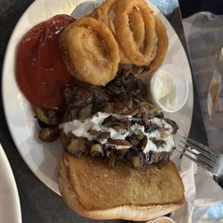 19th Hole Grill - The mo, steak sandwich smothered in mushrooms.