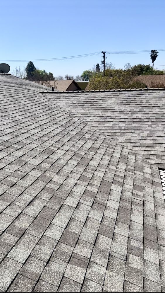 Slide of Economy Roofing & Construction