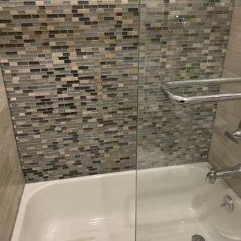 Grout Pros NYC - Tub with recaulking completed. - Painters Near Me
