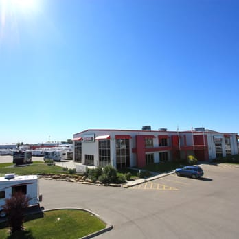 Bucars RV Centre - The dealership and customer-only parking lot. - RV Dealers Near Me - Balzac, Alberta Bucars RV Centre - The dealership and customer-only parking lot. - RV Dealers Near Me - Balzac, Alberta