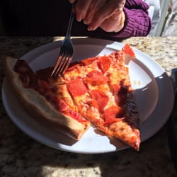 Al Dente Pizzeria & Restaurant - Thin crust pepperoni. Mom asks for it cut into small pieces (apologies to the purists! ;) Very tasty.