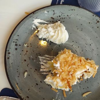 Tommy Bahama Marlin Bar - What little was left of the coconut cloud cake to photograph. - Men's Clothing Near Me - Oklahoma City, Oklahoma Tommy Bahama Marlin Bar - What little was left of the coconut cloud cake to photograph. - Men's Clothing Near Me - Oklahoma City, Oklahoma