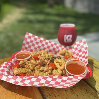 K2 Brothers Brewing - a basket of fried food and a glass of ketchup - Breweries Near Me - Rochester, New York