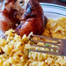 The chicken with yellow rice was delicious.