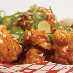 The Nugget Spot - December's Nug of the Month: The General! Chicken Nuggets tossed in our housemade Sweet Chili sauce and topped with scallions.