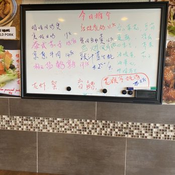 Happy Cafe - a whiteboard with chinese writing on it - Chinese Near Me - Denver, Colorado