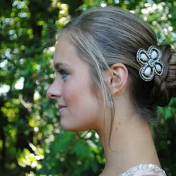 Nicholas Anthony Salon and Day Spa - Prom hair all three years!