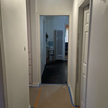 Bright Ideas Painting Corp - Hallway during repairs - Painters Near Me Bright Ideas Painting Corp - Hallway during repairs - Painters Near Me