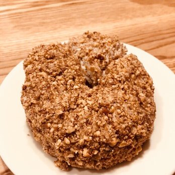 Knead Doughnuts - Brown butter pecan  It looks distorted because I cut into it before snapping the pic. My bad - too excited! - Donuts Near Me - Providence, Rhode Island