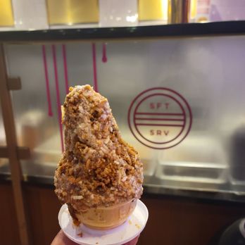 Frozen Gold - 24 Karat - cream cheese soft serve, spiced carrot core, carrot cake & coconut crumble - Desserts Near Me - Colorado Springs, Colorado Frozen Gold - 24 Karat - cream cheese soft serve, spiced carrot core, carrot cake & coconut crumble - Desserts Near Me - Colorado Springs, Colorado