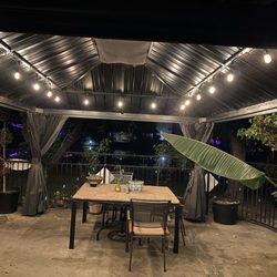 Ground Up Lighting - Sting lighting in patio area.