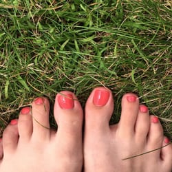 Simply Natural Nails and Spa - Love how my pedicure came out. The color was a pink coral.