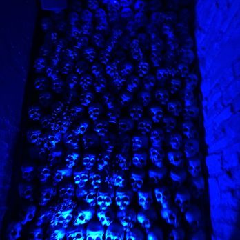 Three Dots and A Dash - The skulls walking down the stairs to the bar - Asian Fusion Near Me - Chicago, Illinois
