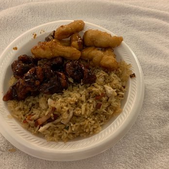 New Peking - a plate of food with rice and meat - Chinese Near Me - Bonita Springs, Florida New Peking - a plate of food with rice and meat - Chinese Near Me - Bonita Springs, Florida