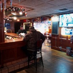 Dining at the bar. Dining at the bar.