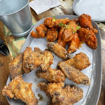 Birdhouse Wingerie & Bar - Hot wings- top      3.5/5 OK  Cacio and Pepe bottom.    4/5. Super good - Chicken Wings Near Me - Dollard-des-Ormeaux, Quebec