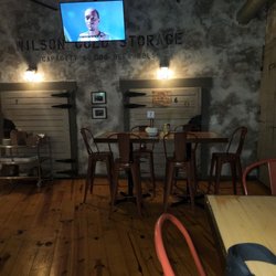Woodcock Brothers Brewery - Seating and television option.