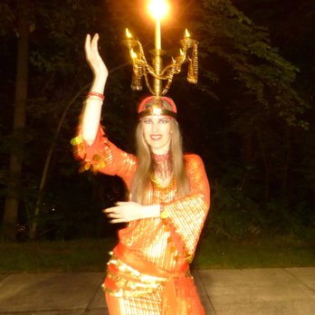 Laska Belly Dancer - Dancing with a Shamadan. - Performing Arts Near Me Laska Belly Dancer - Dancing with a Shamadan. - Performing Arts Near Me