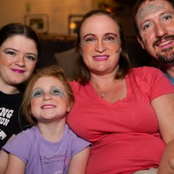Boles Automotive Service Center - Mark and Rachel Boles with their kids cutting up together.  The littlest wanted everyone to do each other's make up...guess who she did?