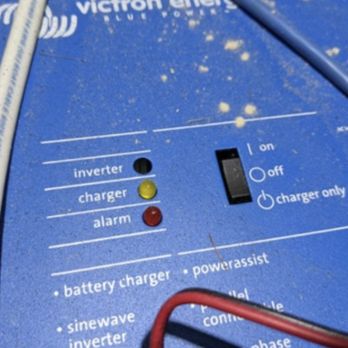 Suncoast Vans - This is showing Suncoast Vans damage to the front of my 2000Watt Victron Inverter/Charger.. Buttons and one off switch smashed.. - RV Repair Near Me - Sarasota, Florida Suncoast Vans - This is showing Suncoast Vans damage to the front of my 2000Watt Victron Inverter/Charger.. Buttons and one off switch smashed.. - RV Repair Near Me - Sarasota, Florida