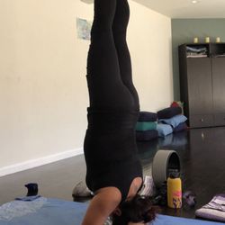 Proper alignment and breathing techniques for headstand