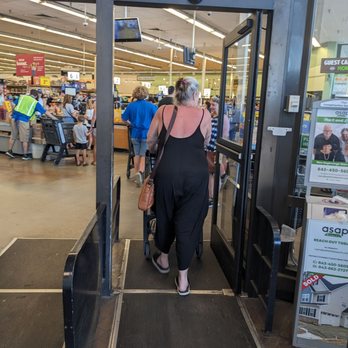 Kroger - a woman entering a store - Grocery Near Me - North Myrtle Beach, South Carolina Kroger - a woman entering a store - Grocery Near Me - North Myrtle Beach, South Carolina