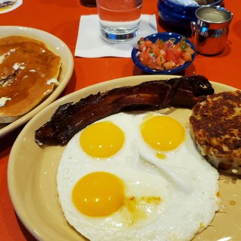Snooze, an A.M. Eatery - Snooze breakfast with 3 eggs, crispy bacon, hashbrowns and a pancake. - Breakfast & Brunch Near Me - Tustin, California Snooze, an A.M. Eatery - Snooze breakfast with 3 eggs, crispy bacon, hashbrowns and a pancake. - Breakfast & Brunch Near Me - Tustin, California