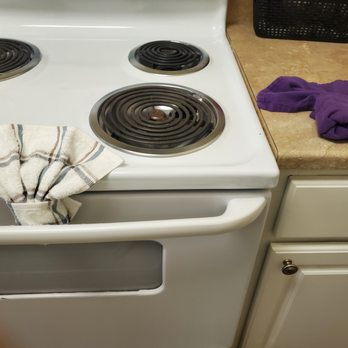 InstaMaids - The nicely folded towels on my spotless stove and counter. - Home Cleaning Near Me InstaMaids - The nicely folded towels on my spotless stove and counter. - Home Cleaning Near Me