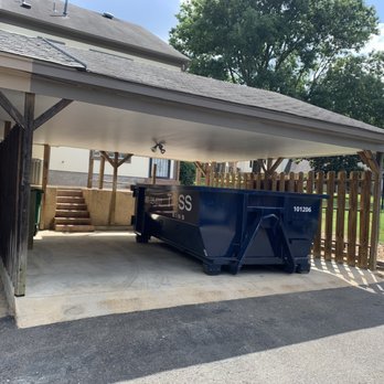 TOSS Bins - 10 Cubic Yard Dumpster in Garage or Car Port - Dumpster Rental Near Me - Memphis, Tennessee TOSS Bins - 10 Cubic Yard Dumpster in Garage or Car Port - Dumpster Rental Near Me - Memphis, Tennessee