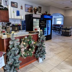 Original Italian Pizza & Family Restaurant - Front entrance. They have a to-go counter and dining area.